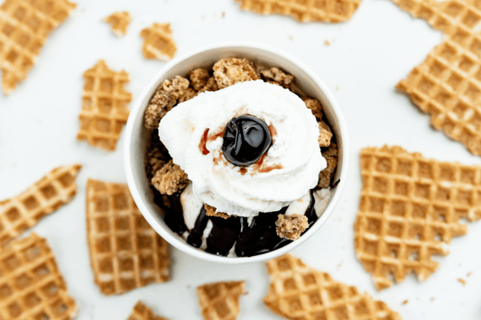 Ice cream sundae with waffle pieces